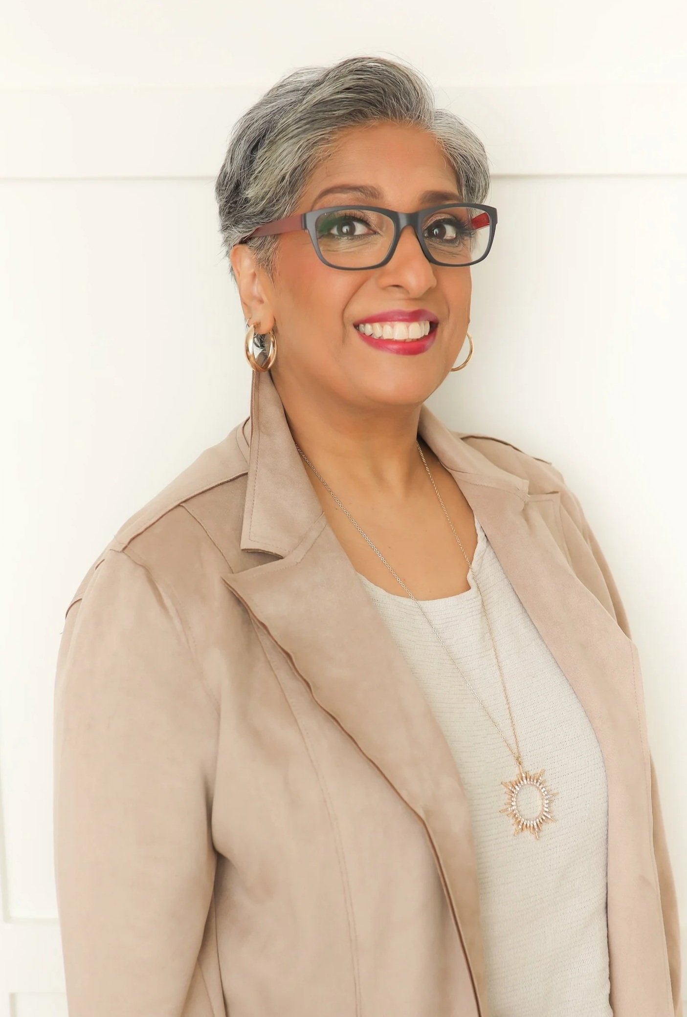 Portrait of Ayesha Adhami-Magueta, founder of The Purposeful Path.